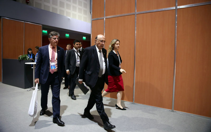© Reuters. Brazil's Finance Minister Meirelles arrives for a news conference at the G20 Meeting of Finance Ministers in Buenos Aires