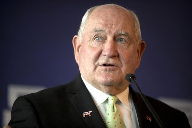 © Reuters. FILE PHOTO - U.S. Secretary of Agriculture Sonny Perdue speaks at an event to celebrate the re-introduction of American beef imports to China