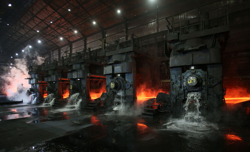 © Reuters. Water flows out as a steel slab is cooled at the Novolipetsk Steel PAO steel mill in Farrell, Pennsylvania