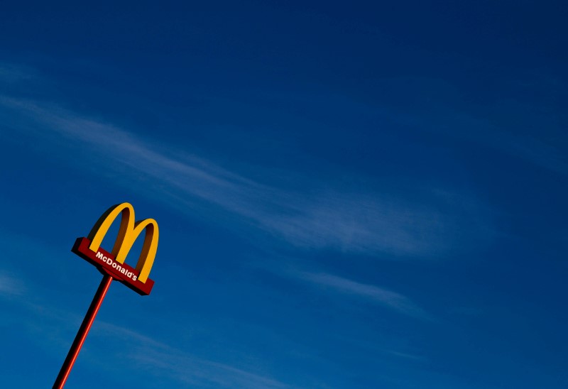 © Reuters. FILE PHOTO: A sign for the U.S. fast food restaurant chain McDonald's is seen outside one of their restaurants in Sint-Pieters-Leeuw