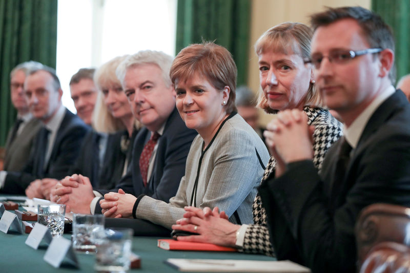 © Reuters. FILE PHOTO: First Minister of Wales, Carwyn Jones, and Scotland First Minister Nicola Sturgeon attend a meeting of the Joint Ministerial Committee, chaired by Britain's Prime Minister Theresa May at 10 Downing Street in London
