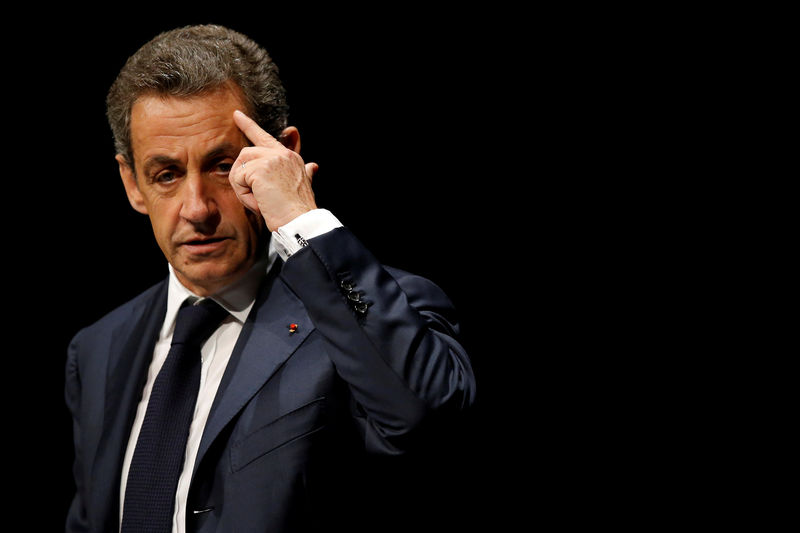 © Reuters. FILE PHOTO: Nicolas Sarkozy, former head of the Les Republicains political party, attends a Les Republicains (LR) public meeting in Les Sables d'Olonne
