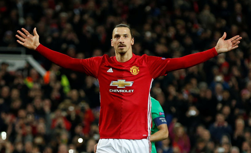 © Reuters. FILE PHOTO: Manchester United's Zlatan Ibrahimovic celebrates scoring their third goal to complete his hat trick