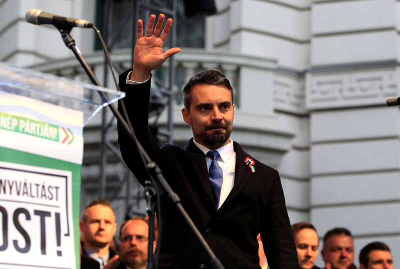 © Reuters. Chairman of the Hungarian right wing opposition party Jobbik Vona waves after his speech at a rally during Hungary's National Day celebrations in Budapest
