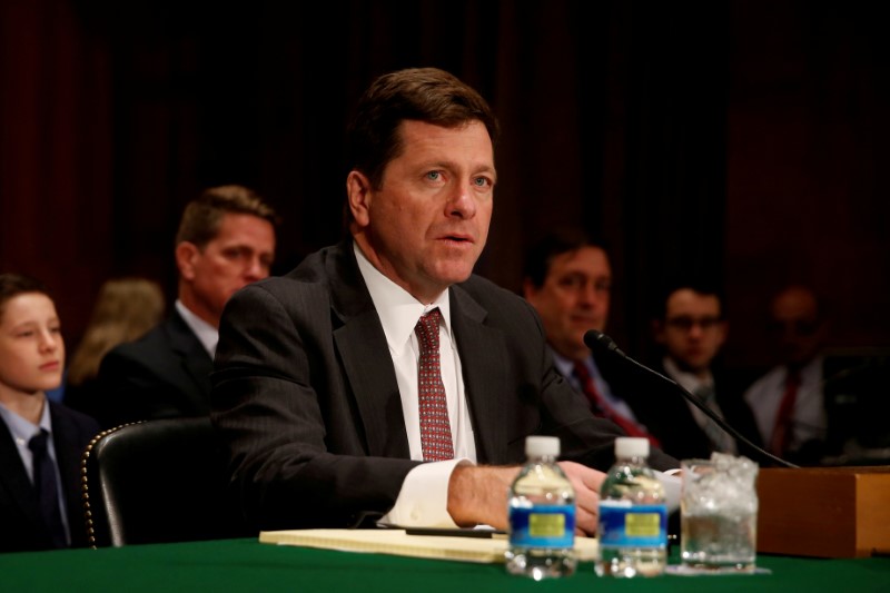 © Reuters. FILE PHOTO: Clayton testifies at a Senate Banking Housing and Urban Affairs Committee hearing on Capitol Hill in Washington