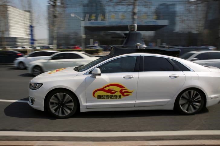 © Reuters. A Baidu's Apollo autonomous car is seen during a public road test for self-driving vehicles in Beijing