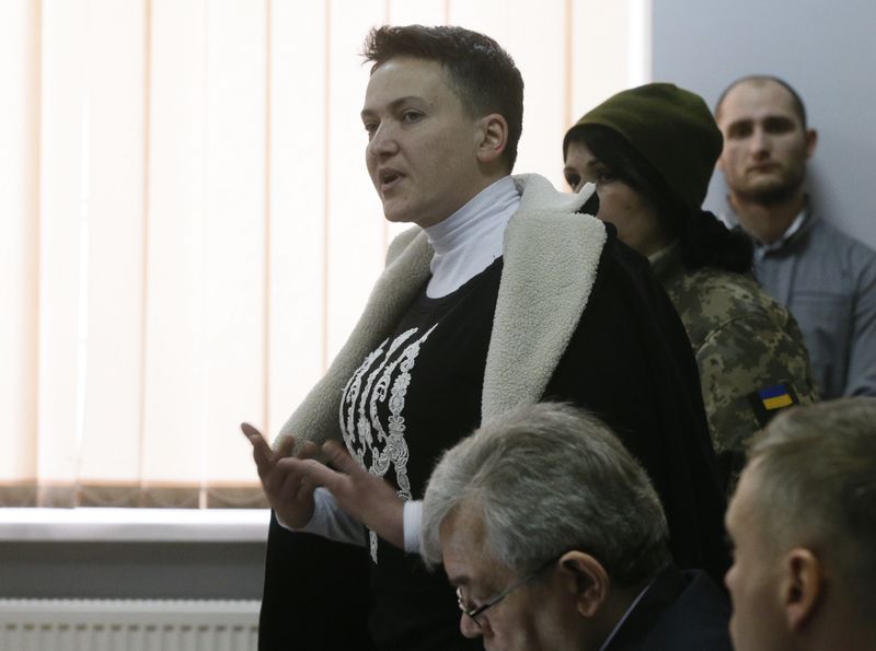 © Reuters. Ukrainian lawmaker Nadiya Savchenko, who was detained on charges of planning a military-style coup, attends a court hearing in Kiev
