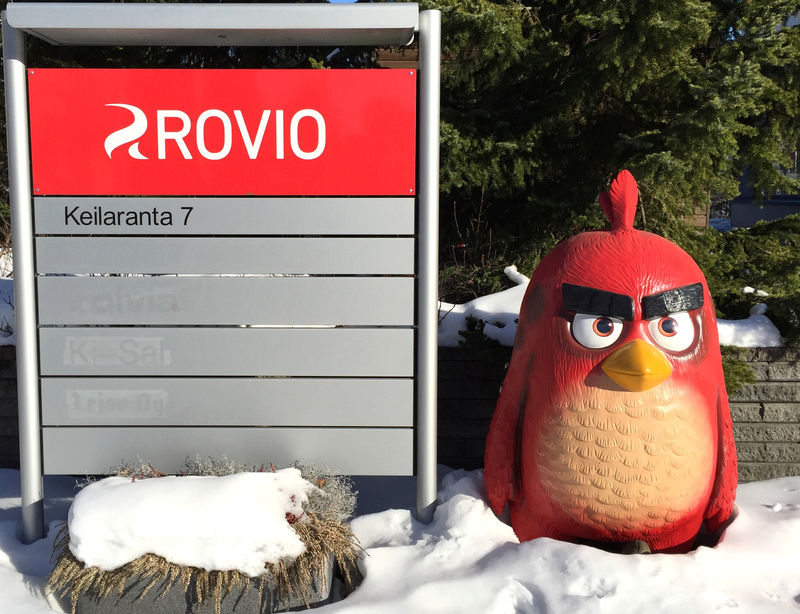 © Reuters. A Rovio sign and a figure of an Angry Birds character are seen in front of Rovio's headquarters in Espoo