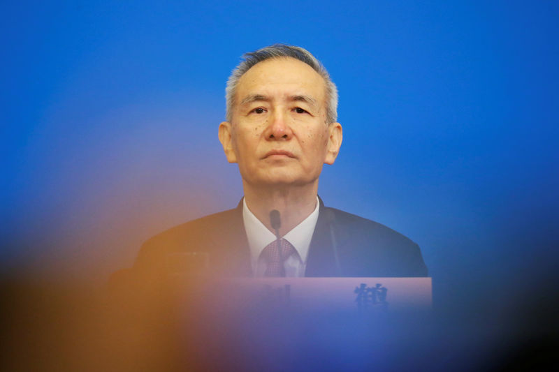 © Reuters. Chinese Vice Premier Liu He attends the news conference following the closing session of the National People's Congress (NPC), at the Great Hall of the People in Beijing