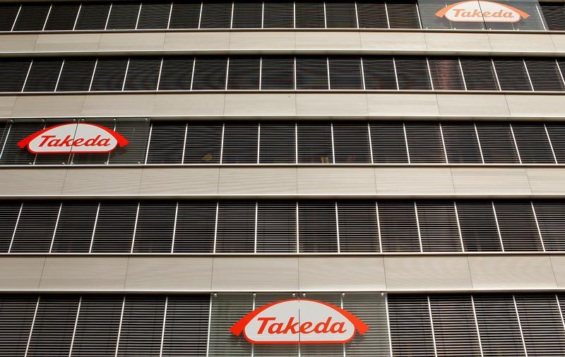 © Reuters. Logos of Japanese Takeda Pharmaceutical Co are seen at an office building in Glattbrugg