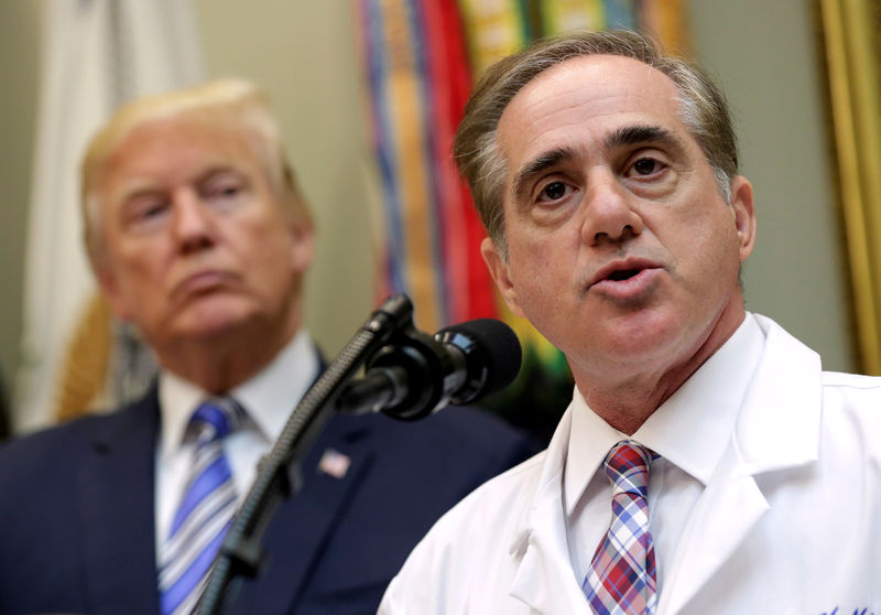 © Reuters. FILE PHOTO: U.S. President Donald Trump listens as U.S. Secretary of Veterans Affairs David Shulkin speaks during a Department of Veterans Affairs Telehealth event at the White House in Washington