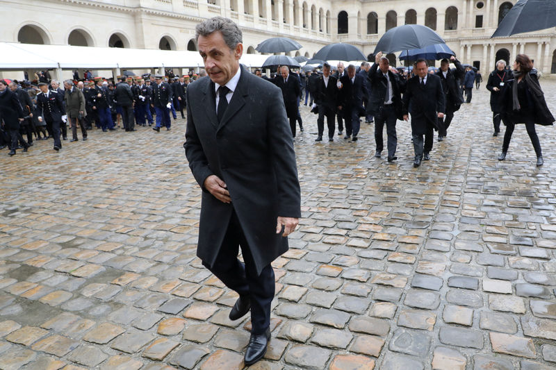 © Reuters. Ex-presidente francês Nicolas Sarkozy deixa cerimônia em Paris