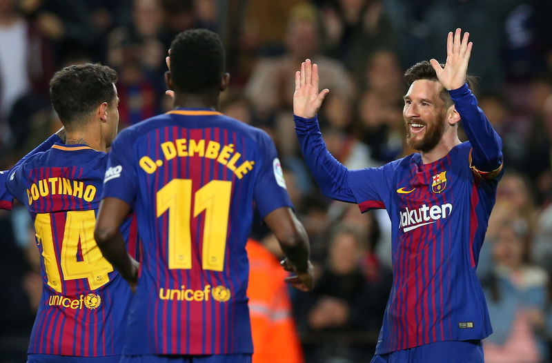 © Reuters. برشلونة يعادل رقما قياسيا بخوض 38 مباراة دون هزيمة في الدوري الاسباني