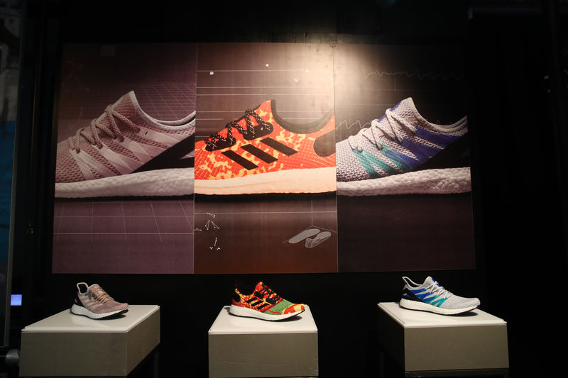 © Reuters. Adidas sport shoes are seen before the company's annual news conference in Herzogenaurach