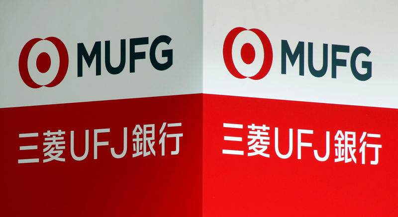 © Reuters. Signboards of MUFG Bank are seen in Tokyo