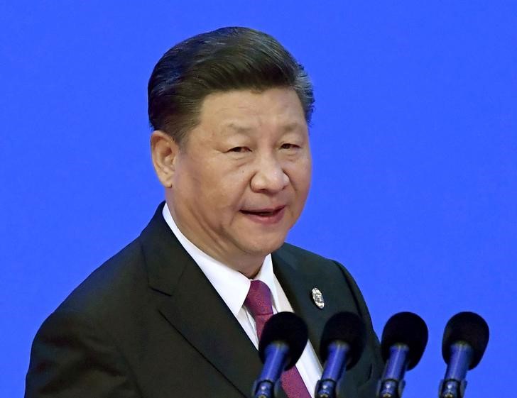 © Reuters. Председатель КНР Си Цзиньпин на Азиатском экономическом форуме в Боао