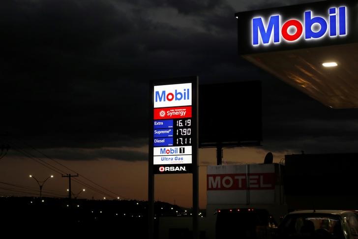 © Reuters. An iluminated board at the new Mobil gas station is pictured in Queretaro