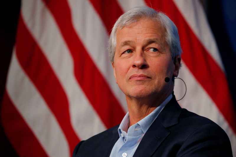 © Reuters. Dimon, CEO of JPMorgan Chase, takes part in a panel discussion about investing in Detroit at the Kennedy School of Government at Harvard University in Cambridge