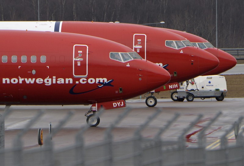 © Reuters. Parked Boeing 737-800 aircrafts belonging to budget carrier Norwegian Air are pictured at Stockholm Arlanda Airport