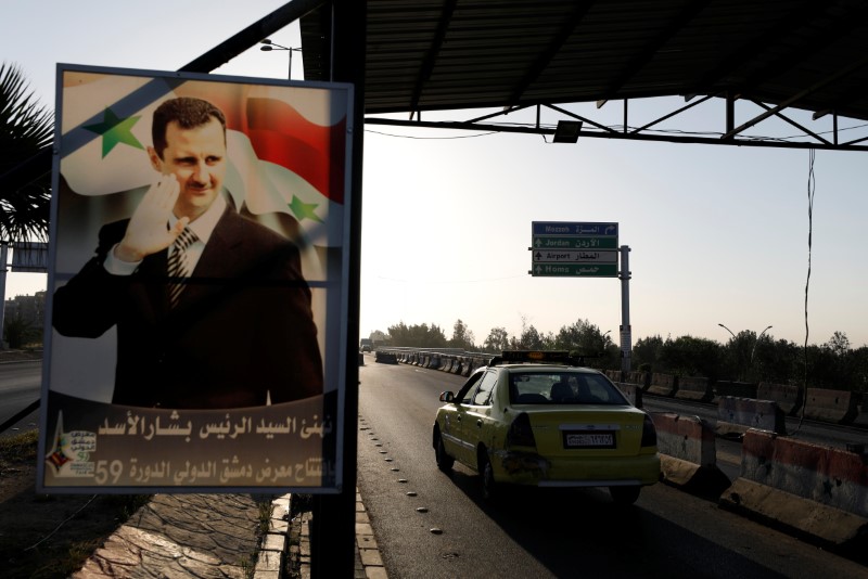 © Reuters. الرئاسة السورية تنشر فيديو للأسد لدى وصوله لممارسة مهام عمله