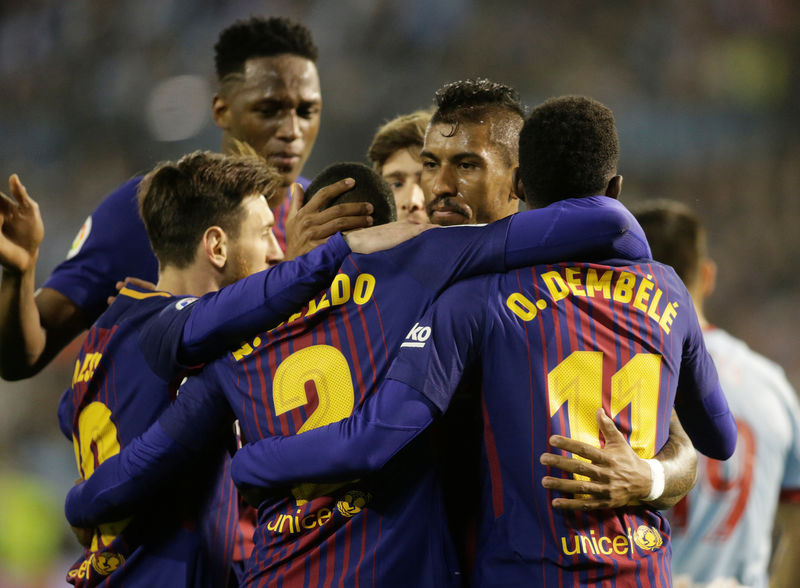 © Reuters. برشلونة بعشرة لاعبين ينجو من انتفاضة سيلتا فيجو ويبقى بلا هزيمة