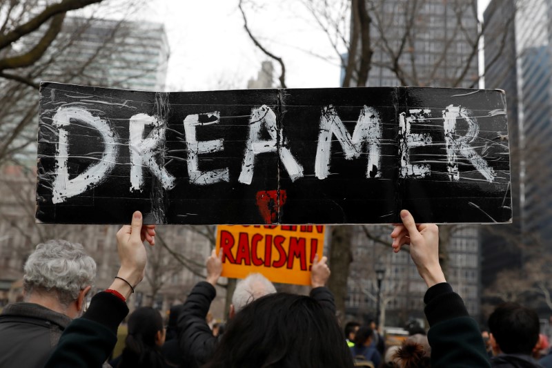 © Reuters. Activists and DACA recipients march up Broadway during the start of their 'Walk to Stay Home,' a five-day 250-mile walk from New York to Washington D.C., to demand that Congress pass a Clean Dream Act, in Manhattan, New York