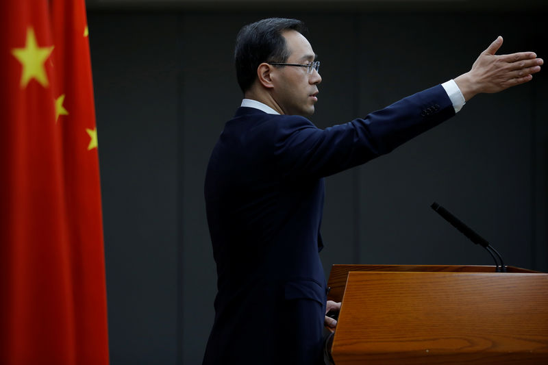 © Reuters. China's Ministry of Commerce spokesperson Gao Feng attends a news conference in Beijing