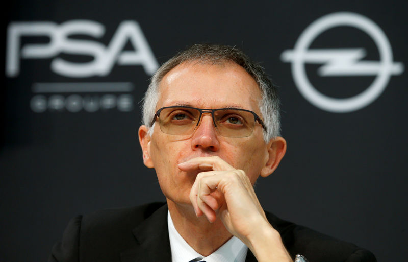 © Reuters. FILE PHOTO: Chairman of the Managing Board of PSA Group Carlos Tavares attends a news conference in Ruesselsheim