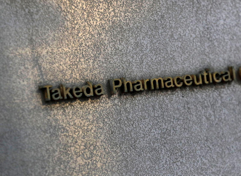 © Reuters. FILE PHOTO: Takeda Pharmaceutical's signboard is seen on its headquarters building in Tokyo