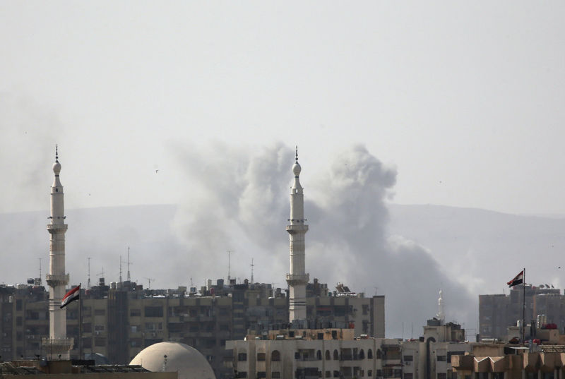 © Reuters. Los rebeldes sirios se retiran de enclave al noreste de Damasco