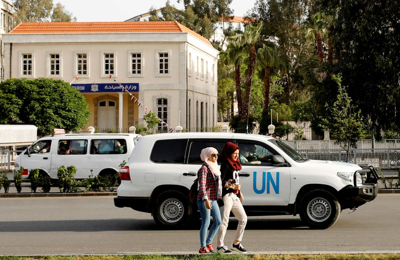 © Reuters. The United Nation vehicle carrying the Organisation for the Prohibition of Chemical Weapons (OPCW) inspectors is seen in Damascus