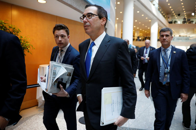 © Reuters. U.S. Secretary of the Treasury Mnuchin arrives for a G20 plenary session during IMF spring meetings in Washington