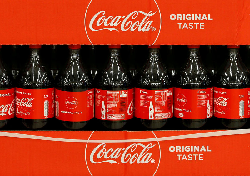 © Reuters. FILE PHOTO: Bottles of Coca-Cola are seen at a Carrefour Hypermarket store in Montreuil, near Paris