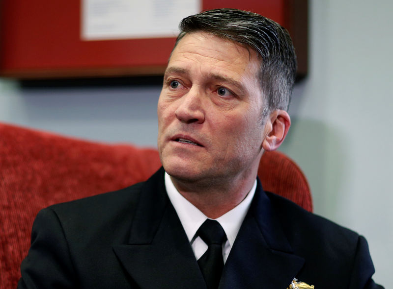 © Reuters. FILE PHOTO: U.S. President Trump's nominee to be U.S. Secretary of Veterans Affairs, Navy Rear Adm. Jackson meets with Senator Tester (D-MT) in Washington