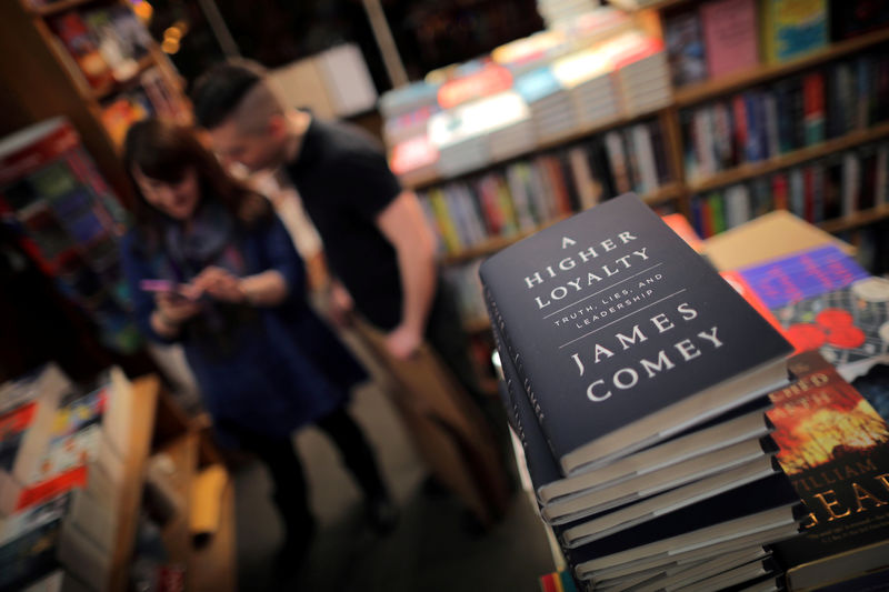 © Reuters. FILE PHOTO: Copies of former FBI director James Comey's book "A Higher Loyalty" are seen at Kramerbooks book store in Washington