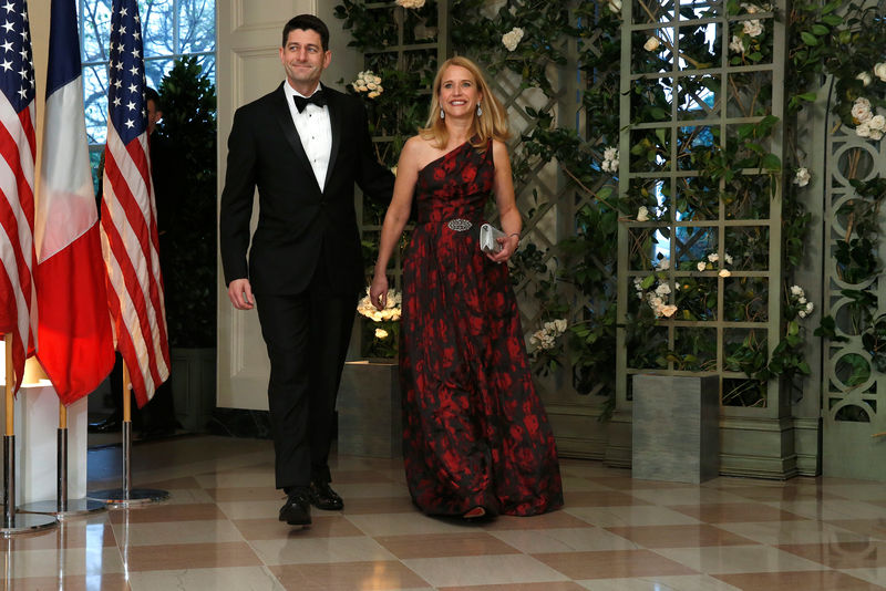 © Reuters. Speaker of the House Paul Ryan (R-WI) and his wife Janna Ryan arrive for the State Dinner in honor of French President Emmanuel Macon at the White House in Washington