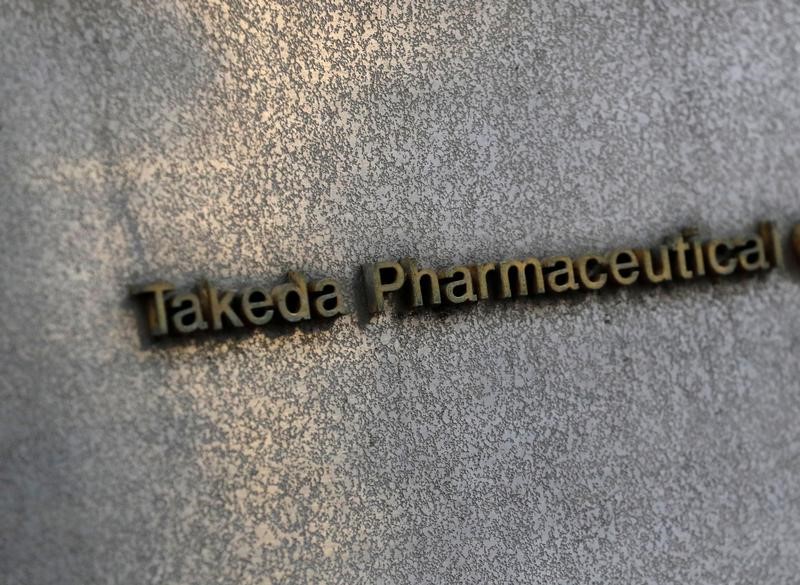 © Reuters. Takeda Pharmaceutical's signboard is seen on its headquarters building in Tokyo