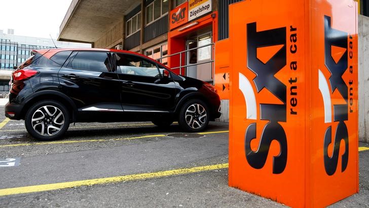 © Reuters. Logo of Sixt car rental is seen in front of a branch office in Zurich