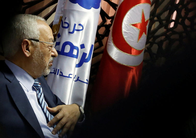 © Reuters. Rached Ghannouchi, the head of the Islamist party Ennahda, speaks during an interview with at Reuters journalists in Tunis