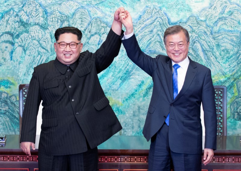 © Reuters. Presidente sul-coreano, Moon Jae-in, e líder norte-coreano, Kim Jong Un