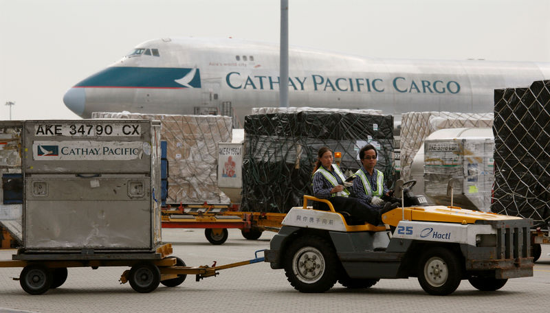 © Reuters. FILE PHOTO: A cargo of Cathay Pacific is handled outside HACTL SuperTerminal 1, the world's busiest air cargo terminal, at the Hong Kong International Airport