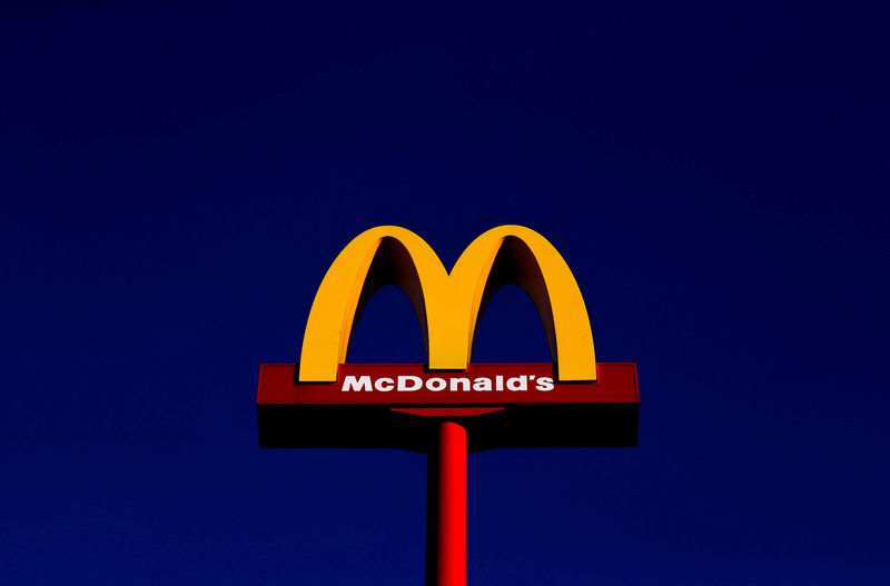 © Reuters. FILE PHOTO: A sign for the U.S. fast food restaurant chain McDonald's is seen outside one of their restaurants in Sint-Pieters-Leeuw