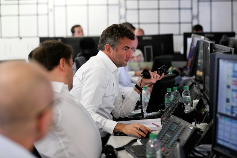 © Reuters. A broker looks at his computer screen on the dealing floor at ICAP in London