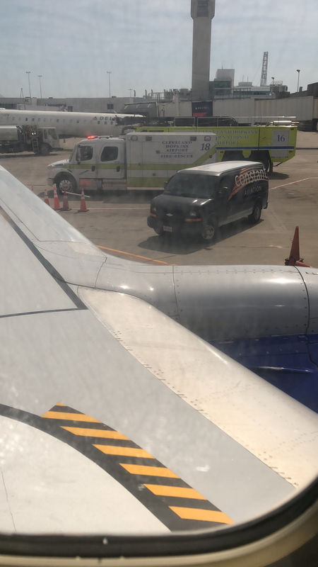 © Reuters. Southwest Flight 957 is seen through a window, in Cleveland