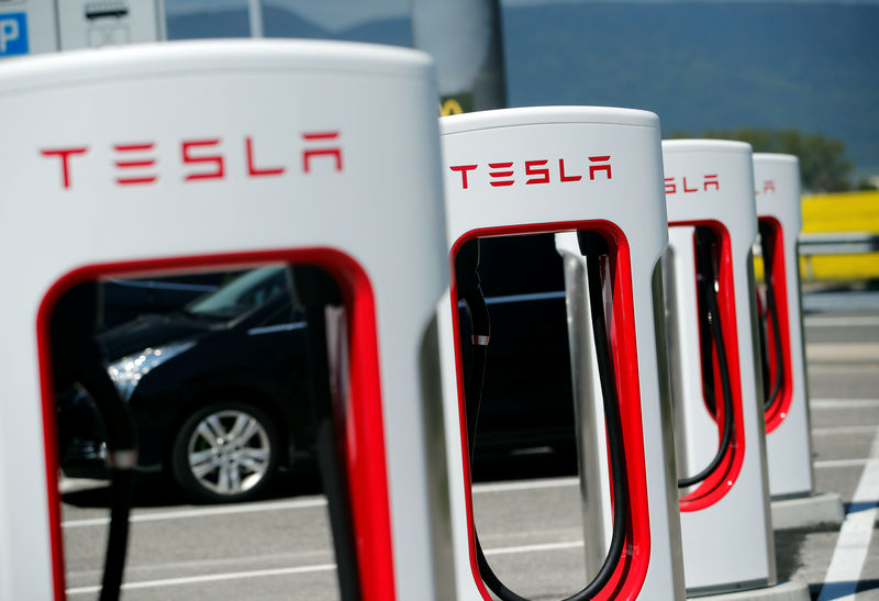 © Reuters. Charging stations for Tesla electric cars are seen near Estavayer-le-Lac