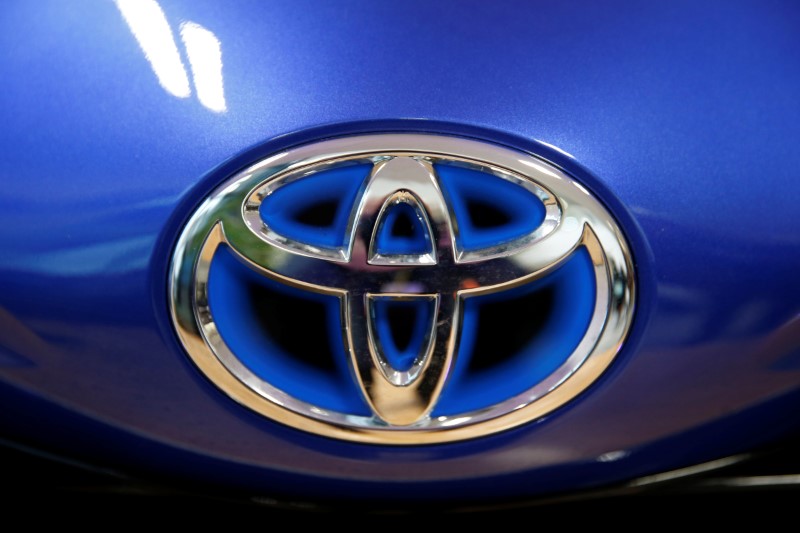 © Reuters. The Toyota company logo is see on a Yaris model car that is on display at Toyota's automobile manufacturing plant in Onnaing