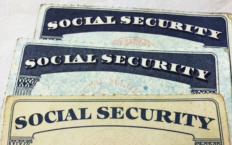 © Reuters. FILE PHOTO - U.S. Social Security card designs over the past several decades