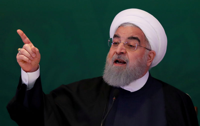 © Reuters. FILE PHOTO: Iranian President Hassan Rouhani speaks during a meeting with Muslim leaders and scholars in Hyderabad