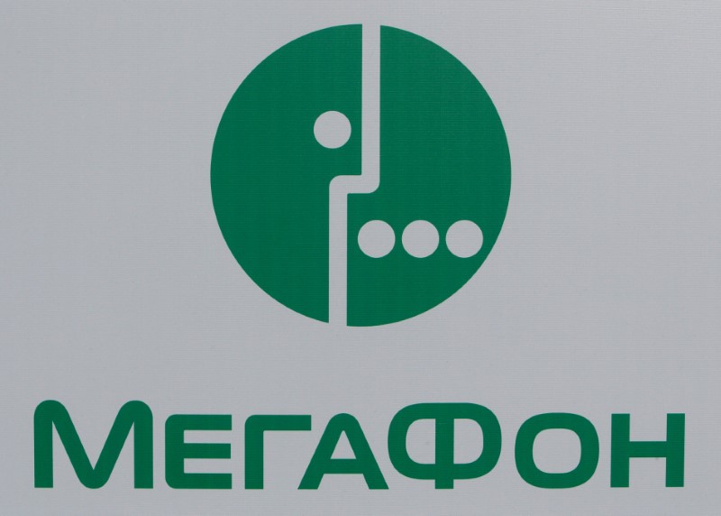 © Reuters. The logo of Russian mobile operator Megafon is seen on a board at the SPIEF 2017 in St. Petersburg
