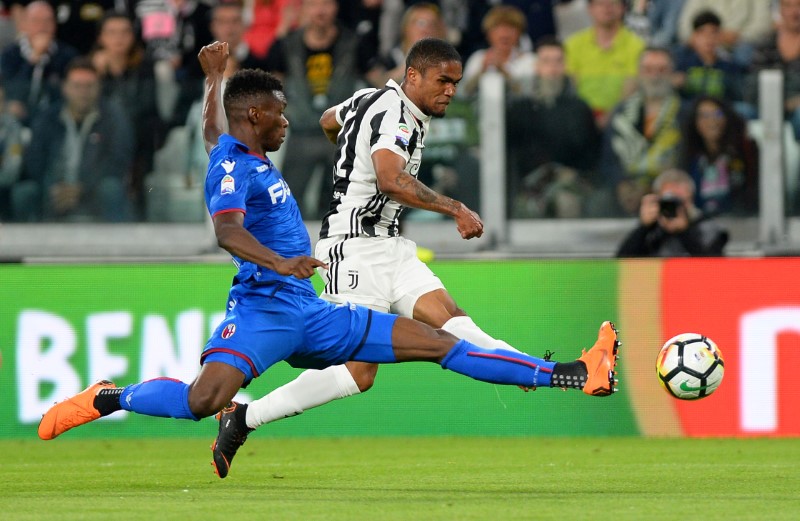 © Reuters. Un'immagine di Juve vs Bologna, partita valida per il campionato di calcio di serie A